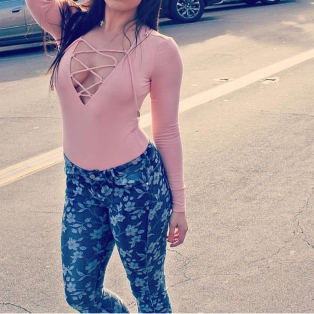 Pink bodysuit by Guess